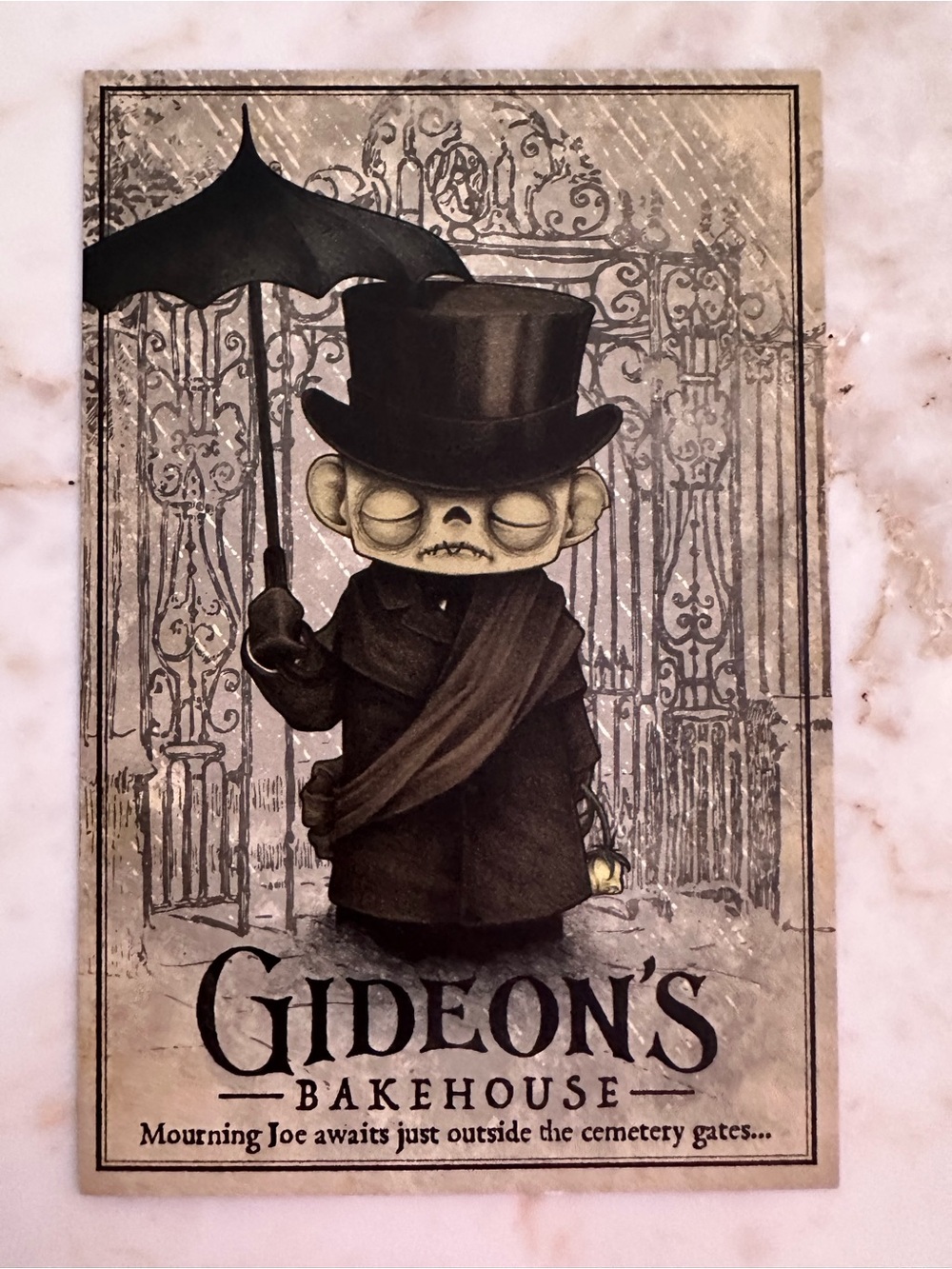 Gideon’s Bakehouse Mourning Joe Outside the Cemetery April Menu Souvenir Card